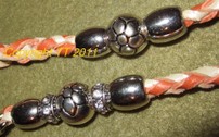 Schmuckleine orange und perlmutt